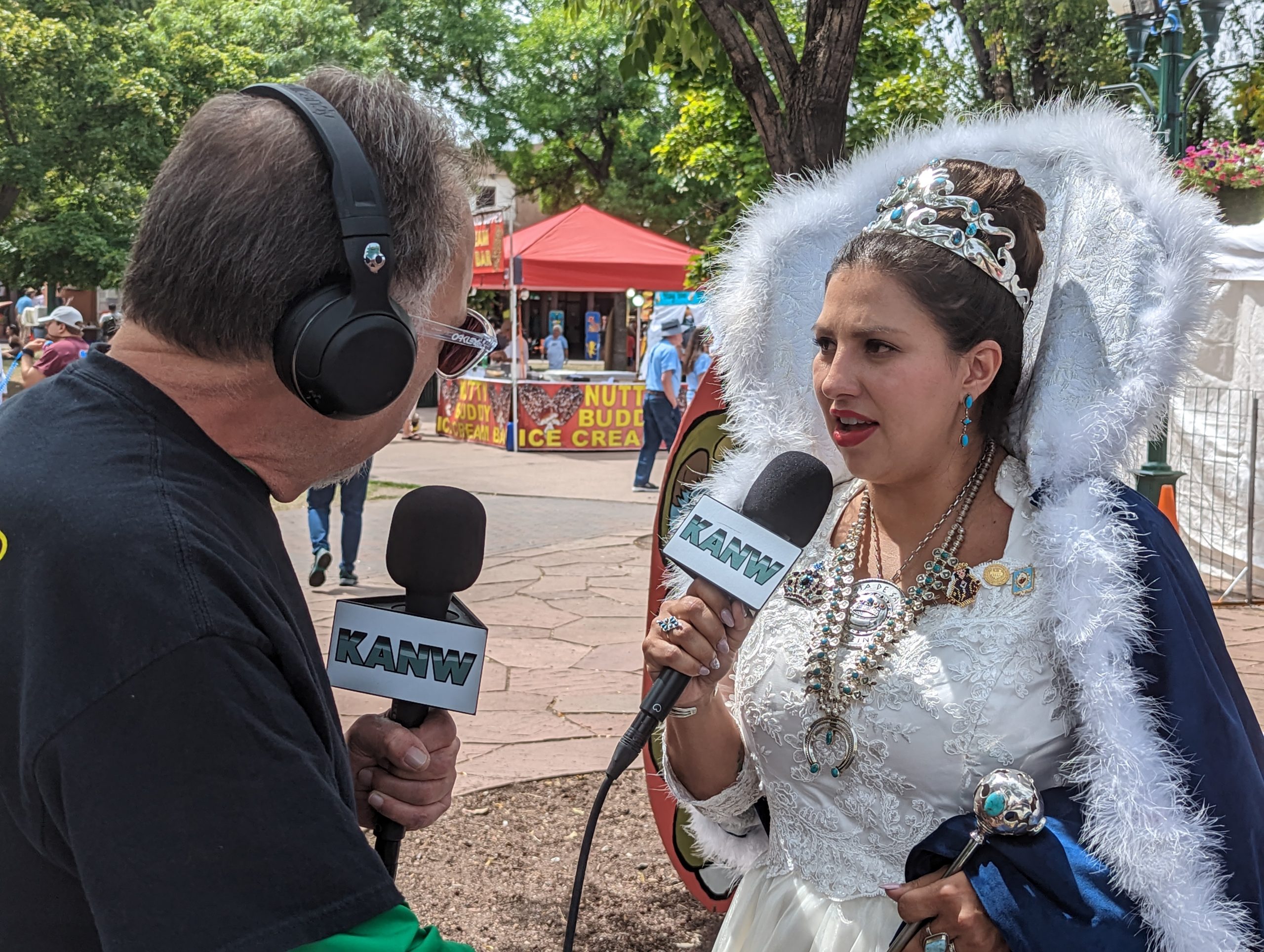 Woman being interviewed at Santa Fe Fiesta