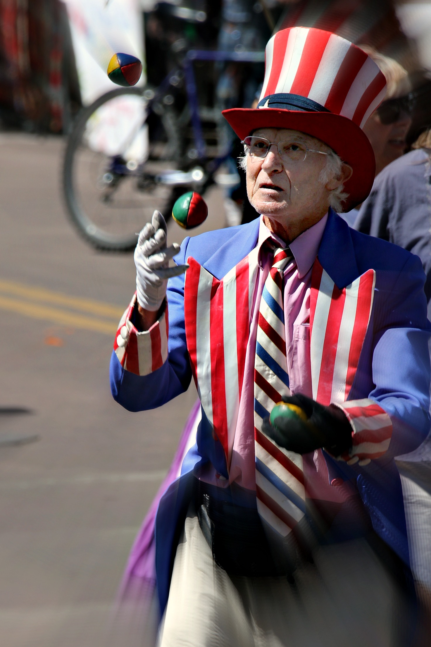 Older man juggling balls