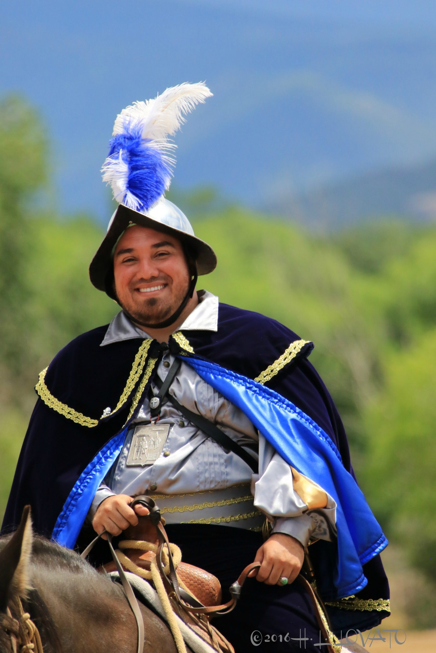 Man on horse dressed as a conquistador