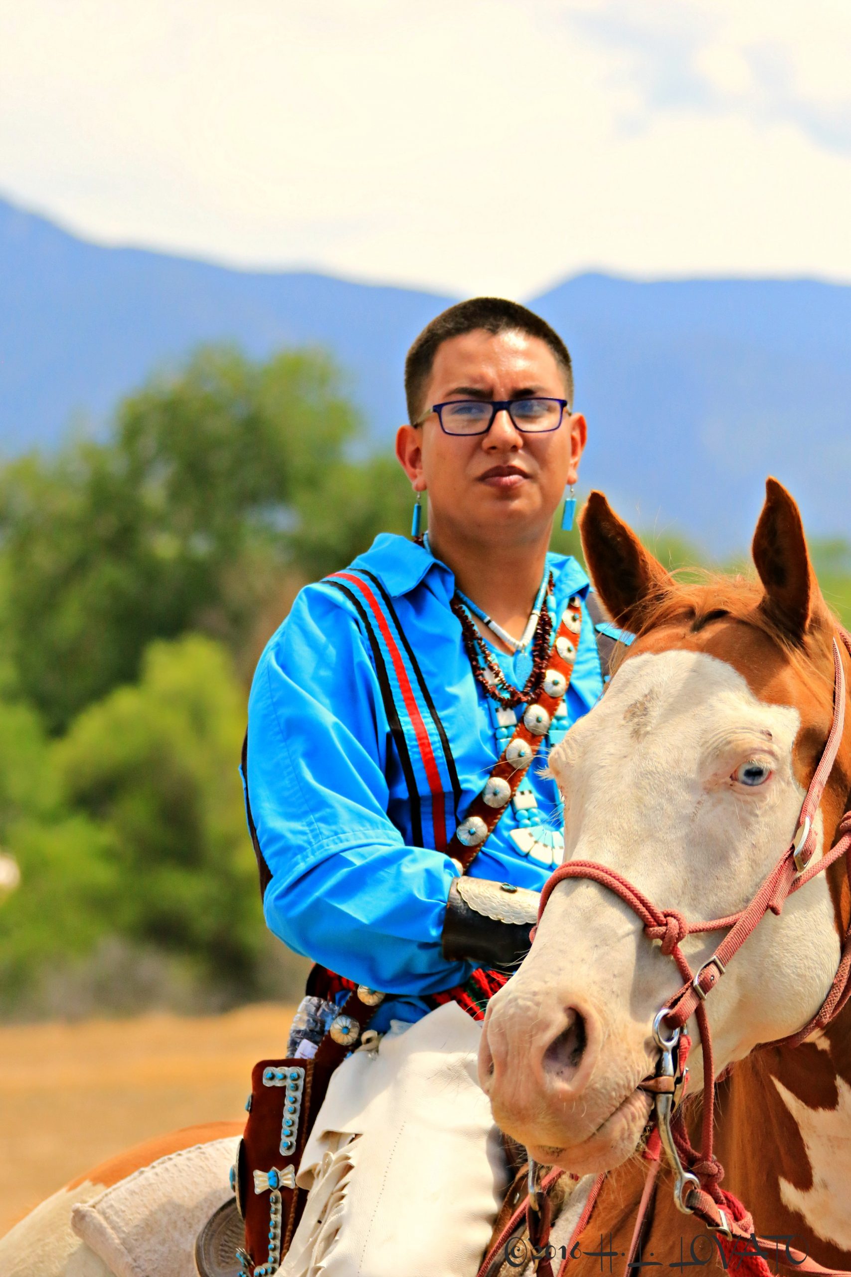 Man on horse dressed in traditional clothing